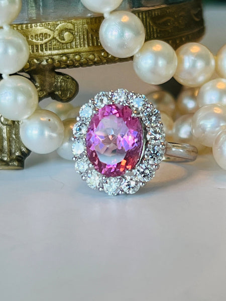 Ring. Oval Pink Tourmaline and Diamond Cluster Ring.