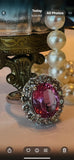 Ring. Oval Pink Tourmaline and Diamond Cluster Ring.
