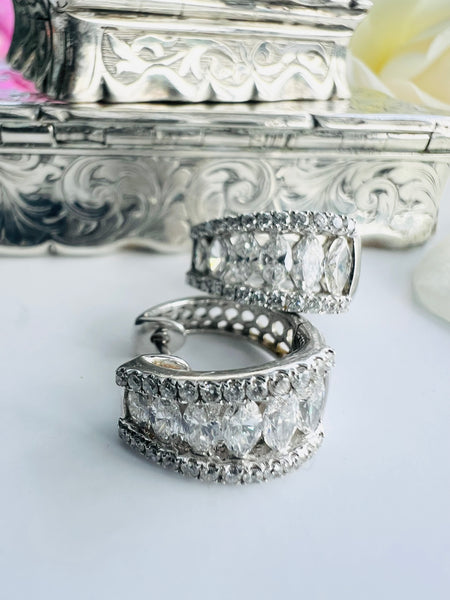 Diamond Huggie earrings.