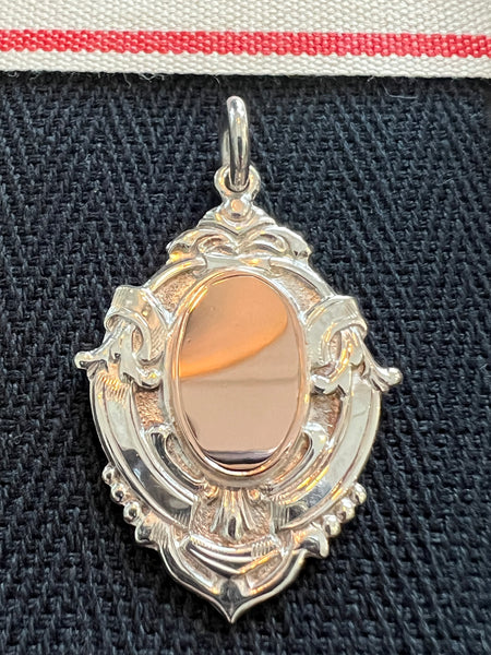 Antique Sterling Silver Medal.