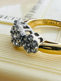 Diamond Daisy Cluster Ring in 18ct gold.