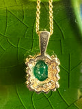 Emerald and Diamond Pendant.